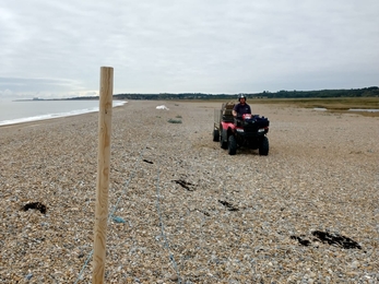 Taking down the beach fence at Dingle Marshes - Lewis Yates 