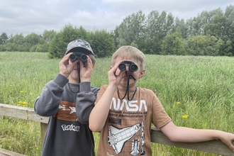 boys with binoculars