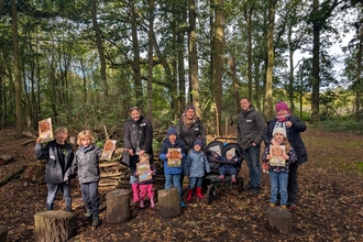 Wild families club in woods