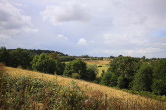 A view across rolling hills on a sunny day