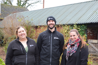 Sophie, Dan and Emma standing in the garden at Foxburrow 