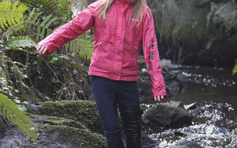 Molly stands in a stream