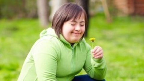 lady holding a flower