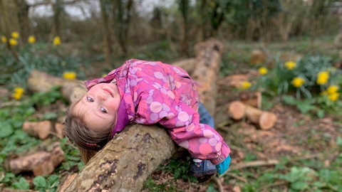 Child on log