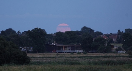 Moon above new visitor centre at Carlton Marshes - Andrew Easton