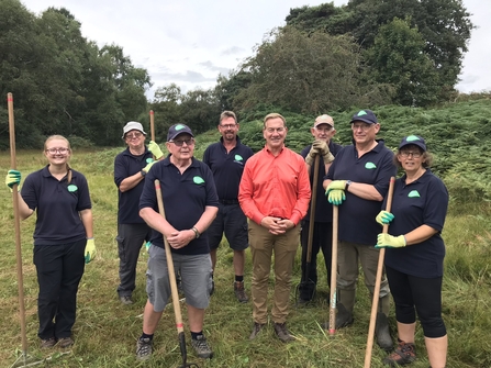 A group of volunteers and Suffolk Wildlife Trust staff with Michael Portillo at Lound Lakes