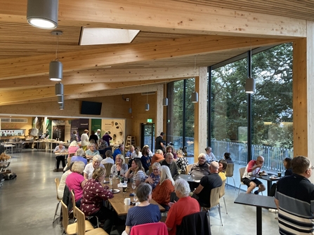 volunteers gathered inside the Carlton Marshes visitor centre