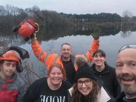 The finance team with wardens will and linsey smiling at the camera