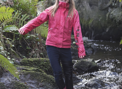 Molly stands in a stream